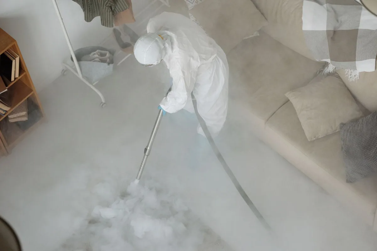 Biohazard cleanup technician in protective equipment, Piedmont, AL